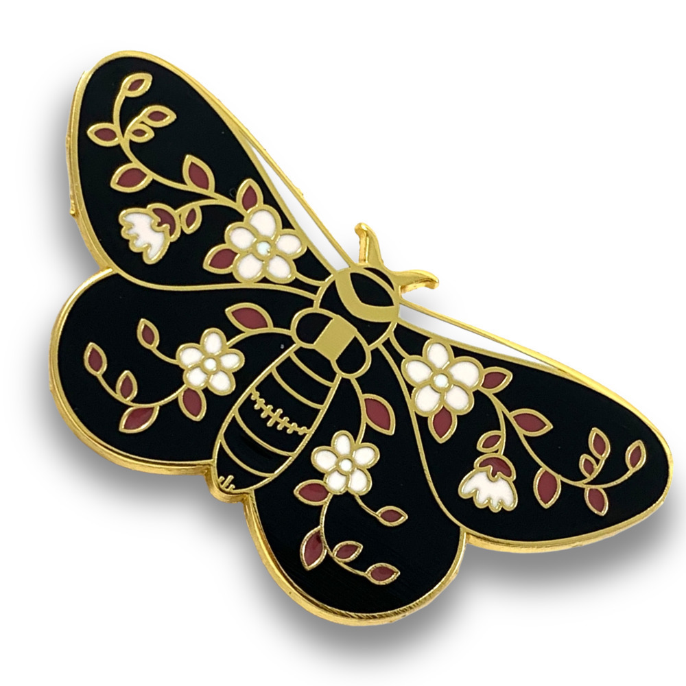 Large gold enamel daisy sacred moth pin